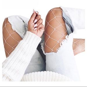 DancMolly white fishnet stockings.